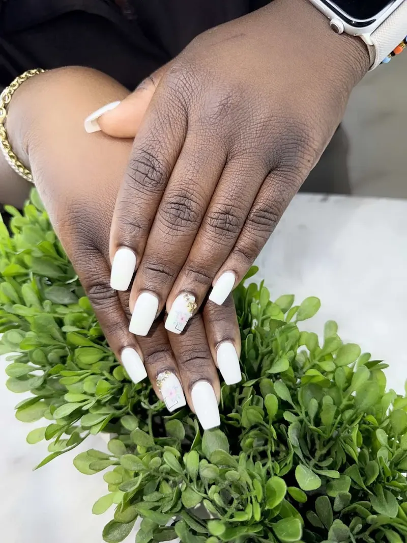 Long white coffin nails with a smooth, polished finish